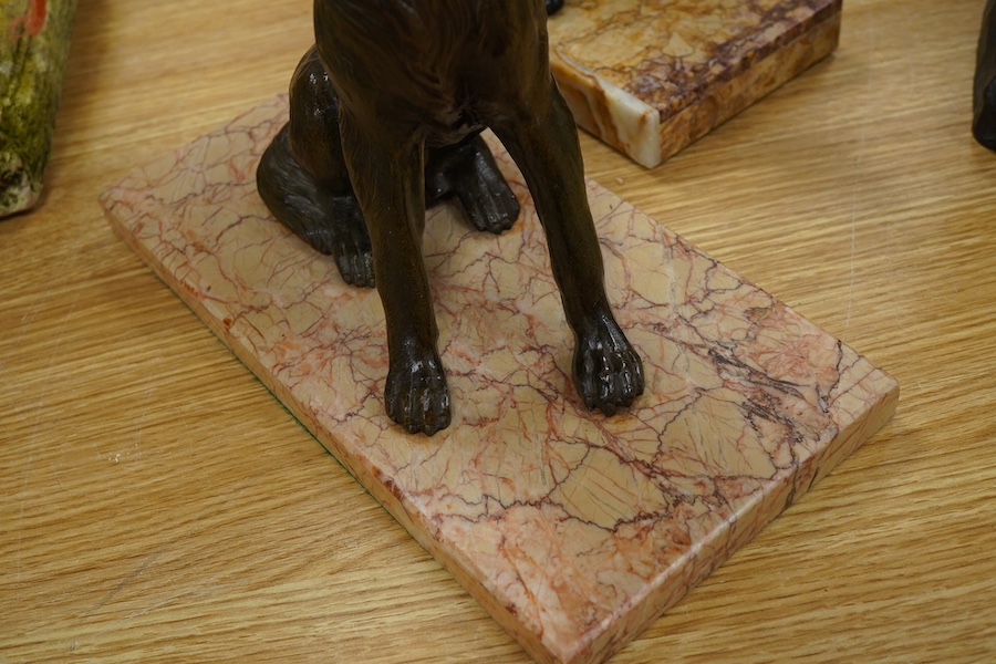 Two Art Deco style bronzed spelter Alsatians, largest 35cm wide
